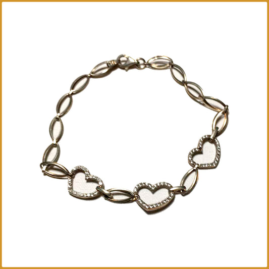 Bracelet modèle coeurs en argent