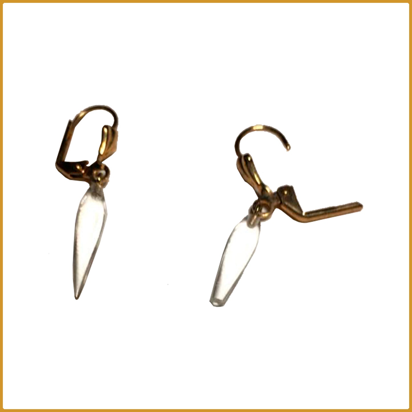 Aretes de oro con cristal.